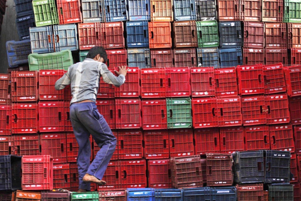 Domestic residents in emerging markets can stabilise capital flow volatility by drawing down their own foreign assets. Photo: AP