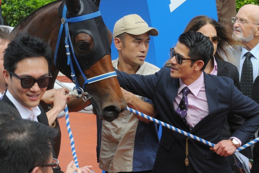 Aaron Kowk, with his horse My Favorite, brings out the entertainment media. Photo: Kenneth Chan