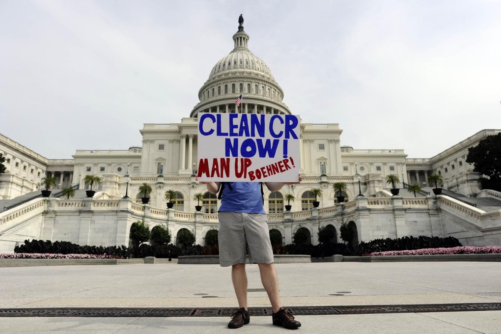 A protester expresses his thoughts at the US Capitol. Photo: AFP