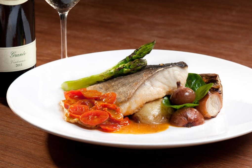 Grilled char fish with shallot confit and grilled vegetables