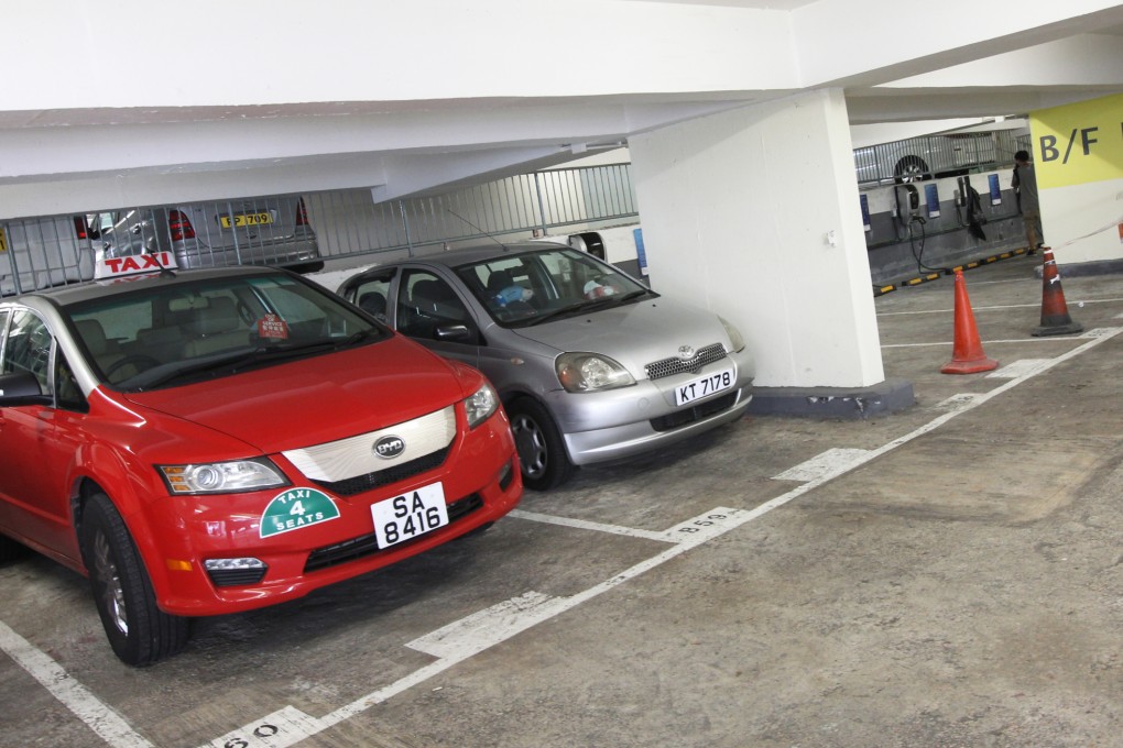 A quick charger for BYD taxis in a Hong Kong parking lot overheated and emitted smoke in June. Photo: David Wong