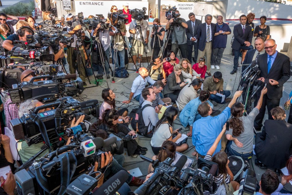 AEG attorney Marvin Putnam talks to media outside the courtroom. He said Jackson's death was "not a tragedy of AEG's making". Photo: AFP