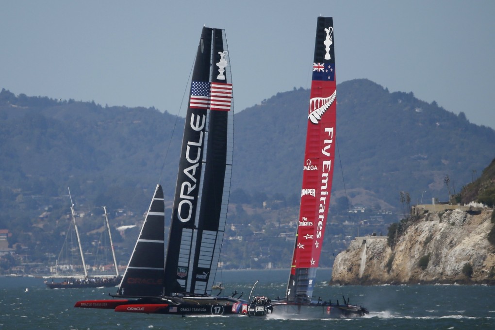 Oracle Team USA overtakes Emirates Team New Zealand. New Zealand is hinting at future America's Cup funding. Photo: Reuters