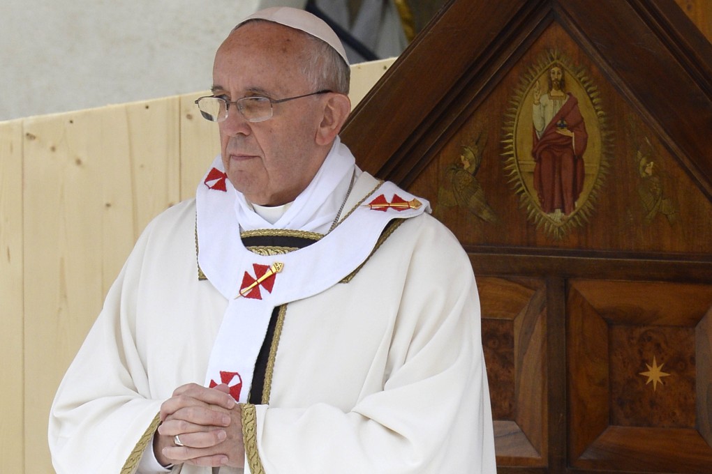 Pope Francis leads a mass outside the St Francis Basilica as part of his pastoral visit in Assisi. Photo: AFP