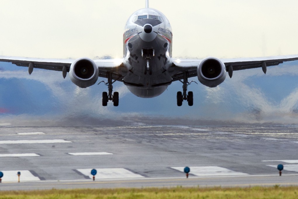An American Airlines Boeing 737 airplane takes off from a runway at Ronald Reagan Washington National Airport in Arlington. Photo: AFP