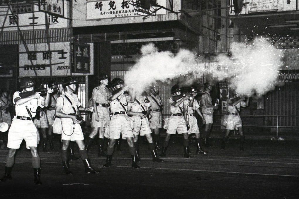 Riot police shooting tear gas to disperse protesters in North Point in 1967. Photo: M. Chan