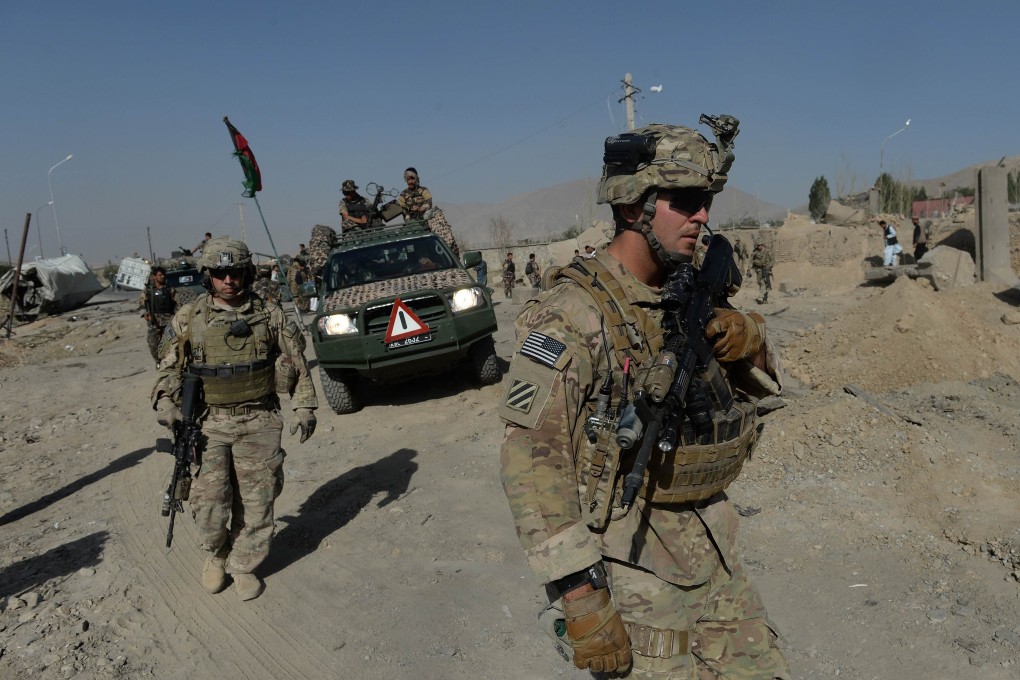 US soldiers in Afghanistan. Four US soldiers in southern Afghanistan were killed by a bomb on Sunday. Photo: AFP