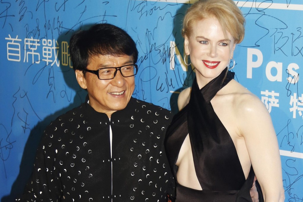 Jackie Chan on the red carpet with Nicole Kidman. Photo: Reuters