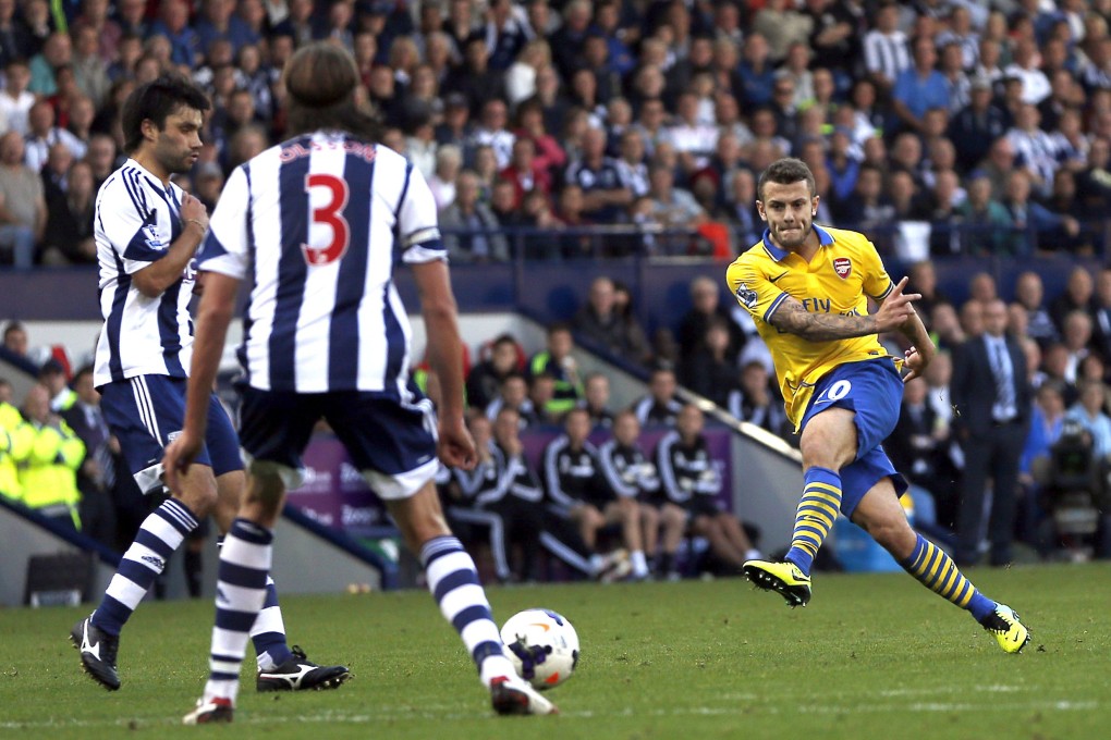 Arsenal's Jack Wilshere unleashes the deflected equaliser against West Brom at The Hawthorns. Photo: AFP