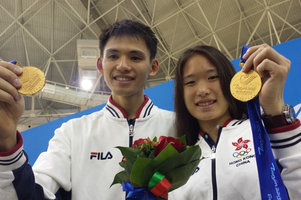 Max Lee and Joey Chan display their gold medals. Photo: SCMP Pictures
