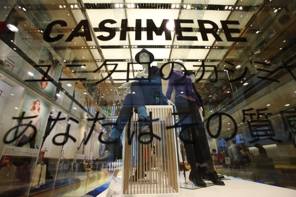 Uniqlo is gambling on its customers being willing to splurge on little luxuries like cashmere sweaters. Photo: Reuters