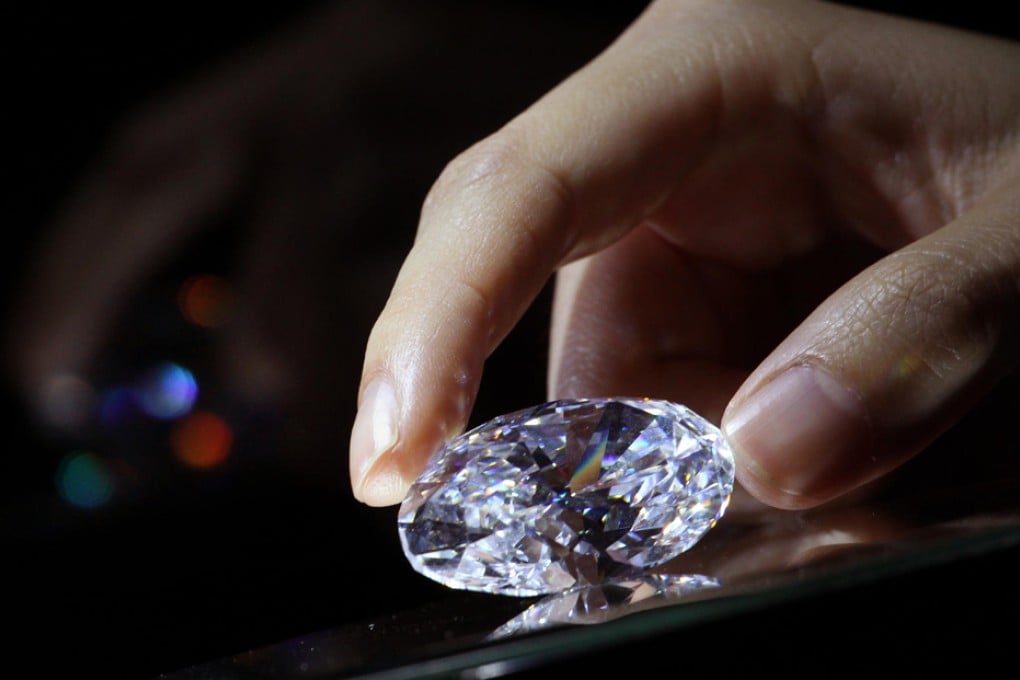 This oval diamond took the world record for any white diamond to go to auction. Photo: Felix Wong