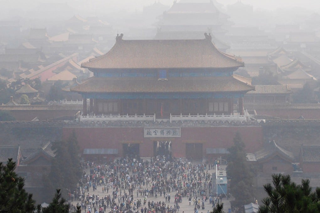 The Forbidden City is shrouded in smog and overrun with tourists. Photo: Image China