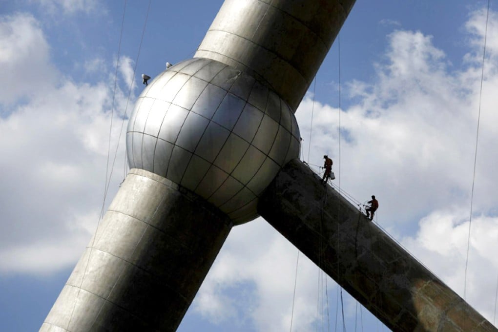 The World Bank says the mainland's massive, investment-heavy stimulus programme has run its course. Photo: Reuters