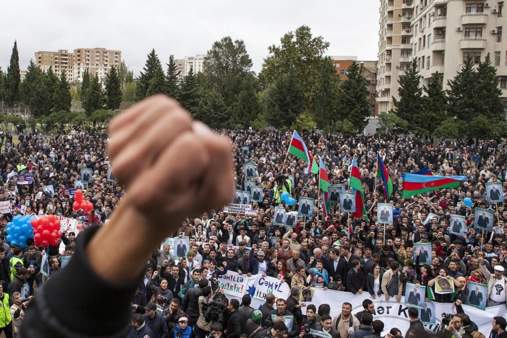 Supporters attend the final election rally of the united opposition in Baku. Observers say they have no chance of winning. Photo: Reuters