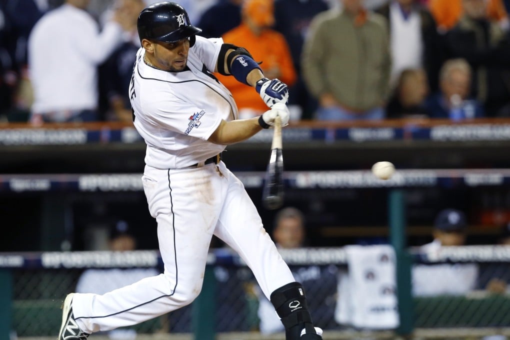 Detroit Tigers' Omar Infante hits a two-run double against the Oakland Athletics. Photo: AP