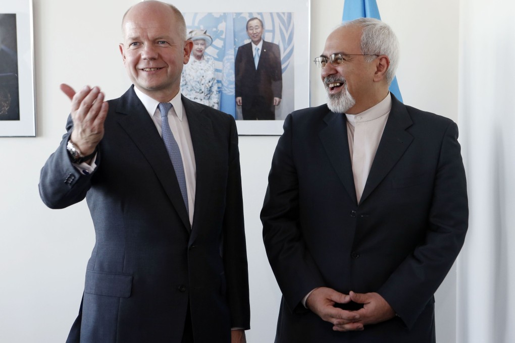 British Foreign Minister William Hague (left) meets with Iran's Foreign Minister Mohammad Javad Zarif. Photo: AFP