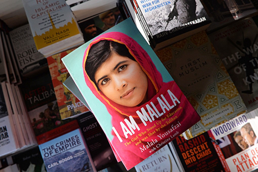 A copy of the memoirs of Pakistani child activist Malala Yousafzai is pictured in a bookstore in Islamabad on Tuesday. Photo: AFP