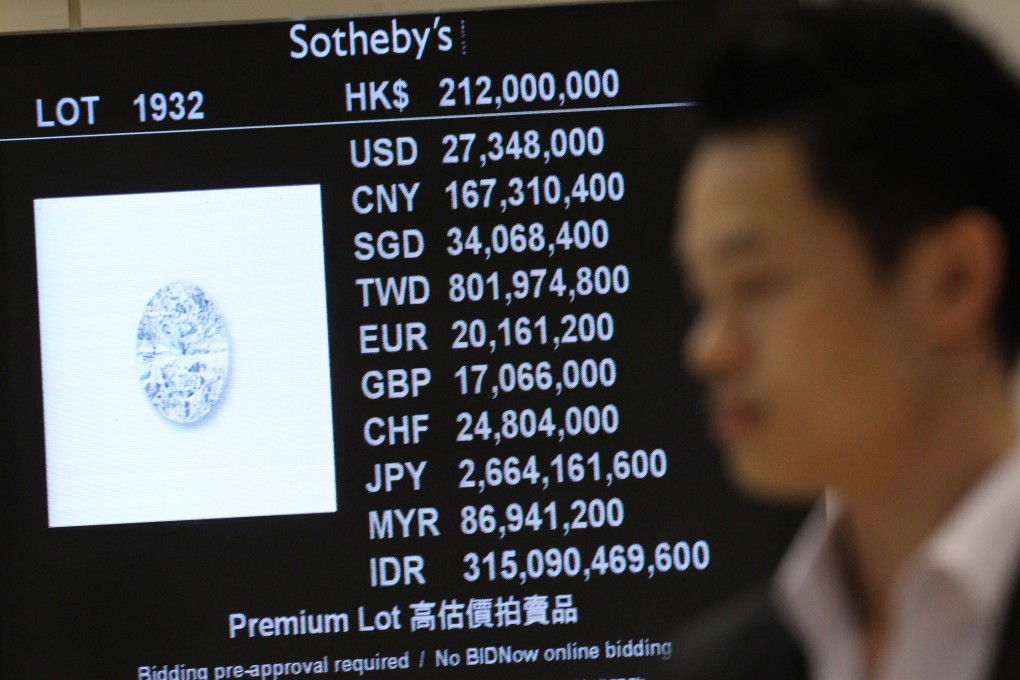 Sotheby's auction for an oval diamond at Hong Kong Convention and Exhibition Centre. Sotheby's raised HK$4.2bn in record sales in Hong Kong this autumn. Photo: SCMP Pictures