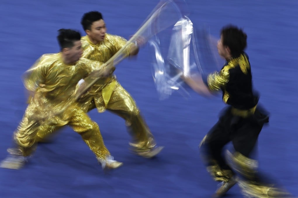 Leung Cheuk-hei, Cheng Chung-hang and Leung Ka-wai in action on their way to retaining their gold. Photo: AP