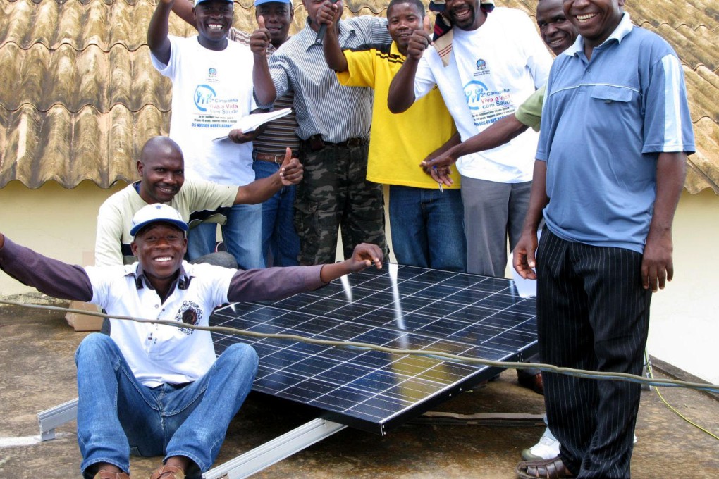 Dulas holds a training session for one of its stand-alone solar vaccine refrigerator system in Angola