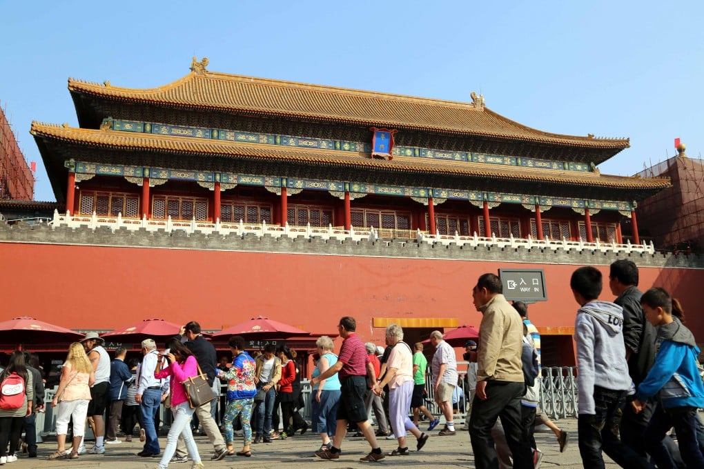 Tourists visit the Palace Museum in Beijing. Photo: Xinhua