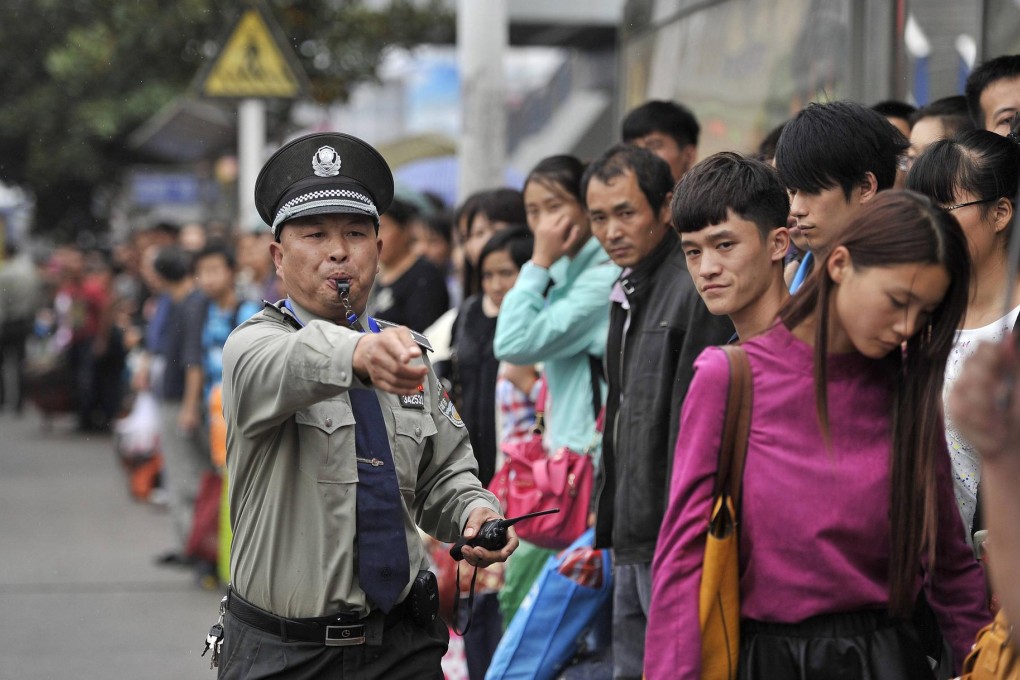 Long lines, like this one at a railway station in Hefei in Anhui, defined "golden week" for many travellers. Photo: Reuters