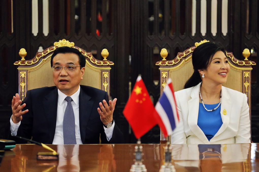 Premier Li Keqiang and Thailand's Prime Minister Yingluck Shinawatra during a meeting at government house in Bangkok, Thailand, on Friday. Photo: EPA