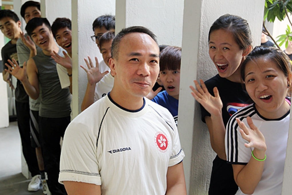 Sammy Tam Kai-cheung with some of the teenagers he teaches judo in at Ho Man Tin. Photo: Dickson Lee
