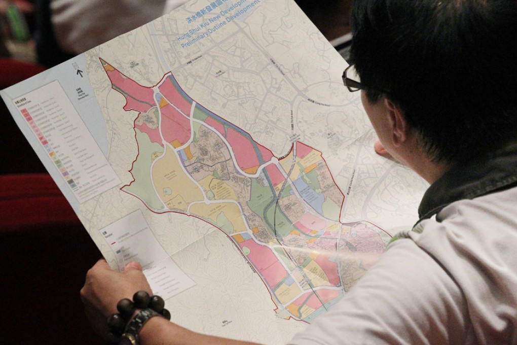People attend a public forum to discuss the government's proposed development of the Hung Shui Kiu area planning and engineering study at Yuen Long Theatre. Photo: K. Y. Cheng