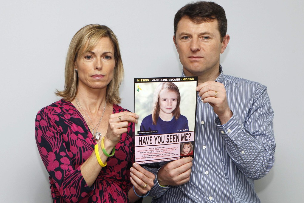 Kate and Gerry McCann are seen posing with a computer generated image of how their missing daughter Madeleine might look. Photo: Reuters