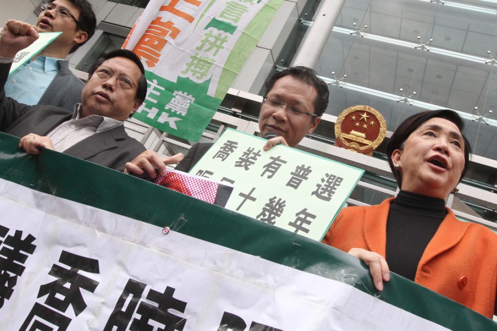 Albert Ho Chun-yan, Richard Tsoi Yiu-cheong, Emily Lau Wai-hing and members of Democratic Party protest for universal suffrage. Photo: K. Y. Cheng