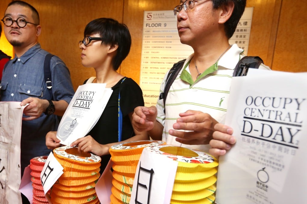 Social workers promote an Occupy Central discussion seminar. Photo: Sam Tsang
