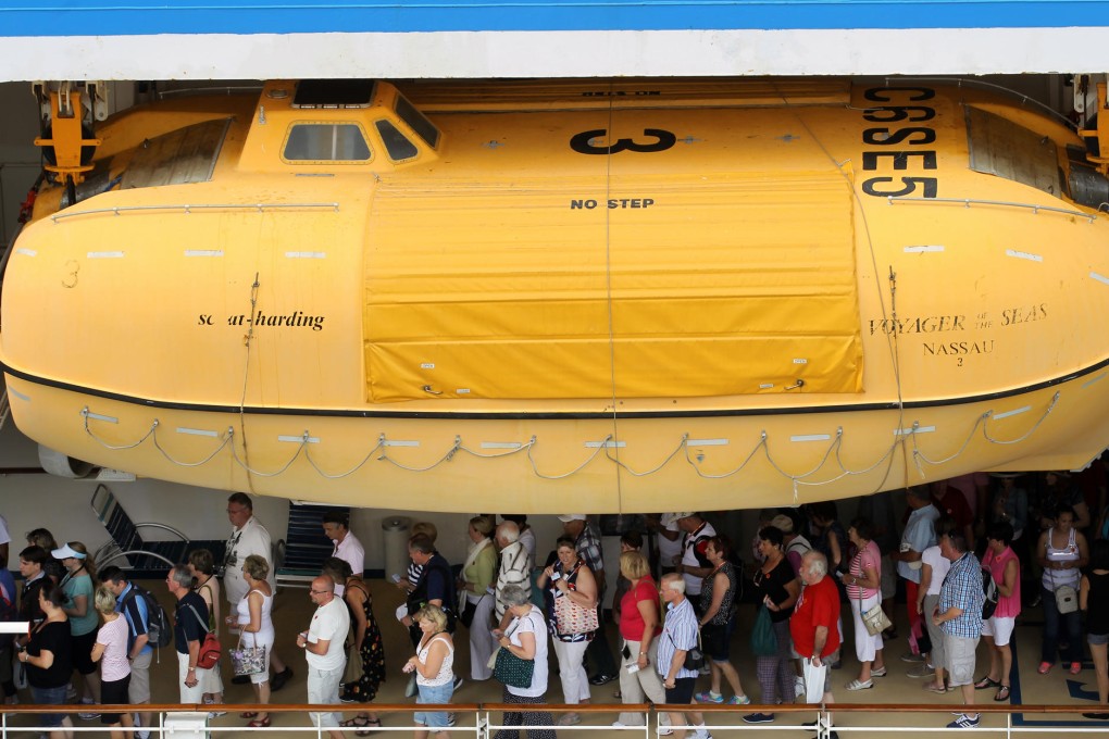 Passengers disembark from the Voyager of the Seas, the third cruise ship to dock at the new terminal. Photo: Edward Wong