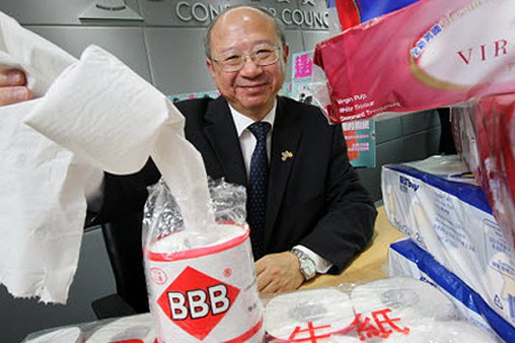 The Consumer Council's Michael Hui King-man shows a roll of BBB toilet paper which the council's tests found was contaminated with bacteria that could lead to infection. Photo: Dickson Lee