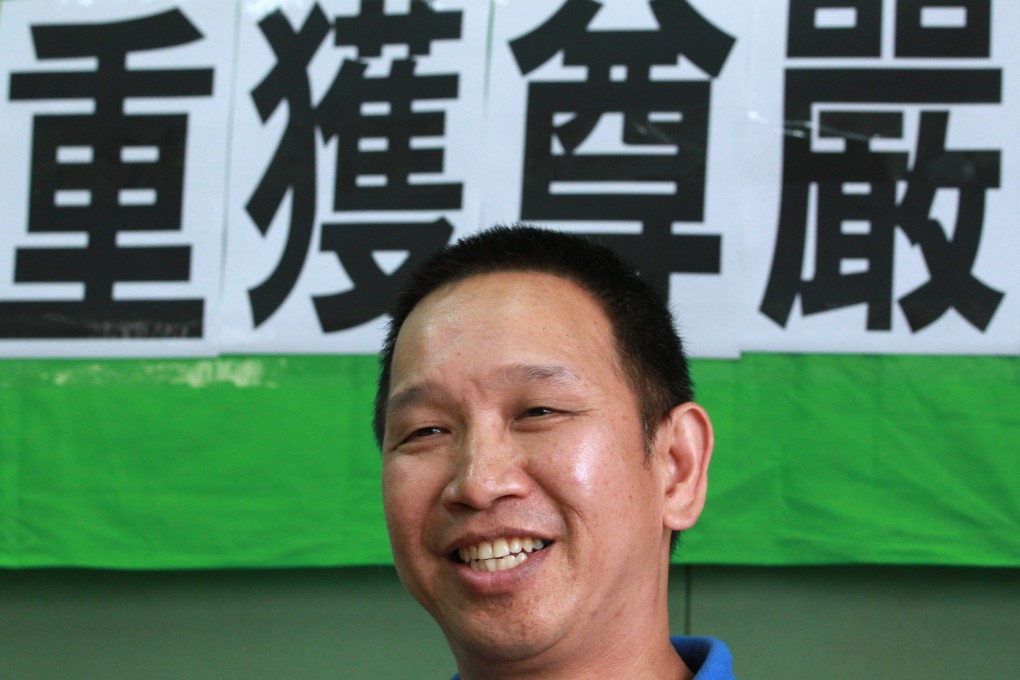 Ho For-hei, a security guard says he is happy about the minimum wage law with his raised salary. Photo: May Tse