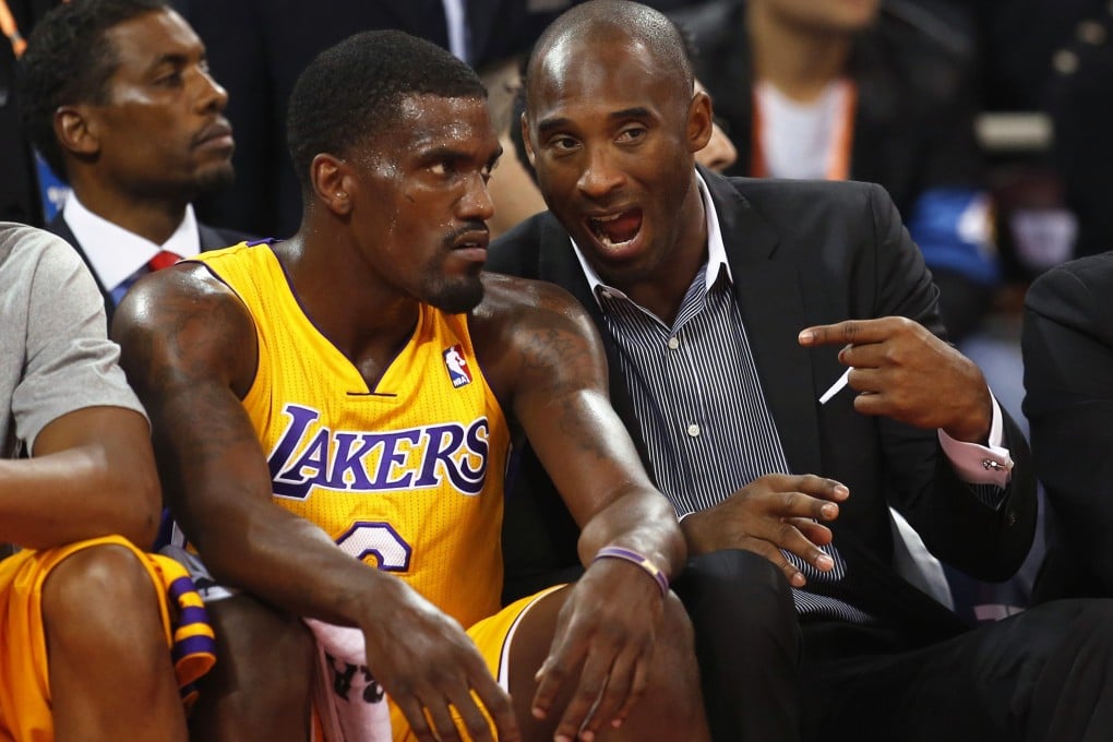 Los Angeles Lakers' Kobe Bryant (right), on the bench, with teammate Darius Johnson-Odom in Beijing. Photo: Reuters
