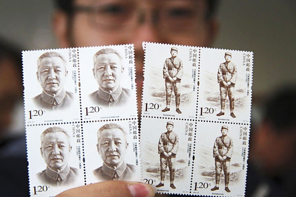 Postage stamps of Xi Zhongxun were issued on Tuesday to mark his 100th birth anniversary. Photo: Reuters