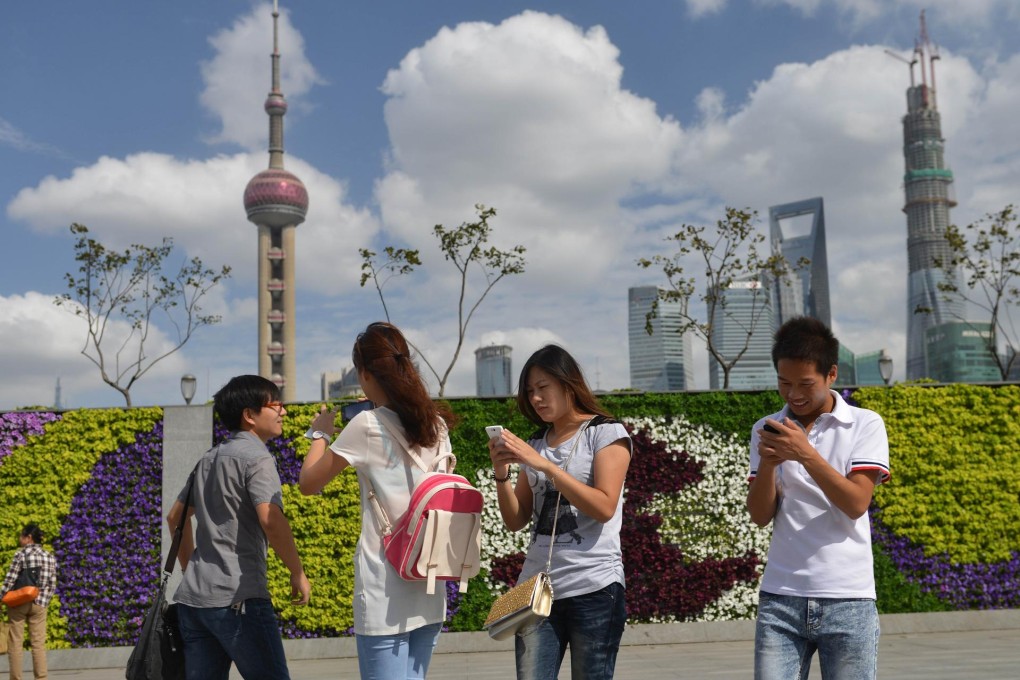 Mobile phone subscribers on the mainland can look forward to theoretical internet download speeds of up to 100 megabits per second when 4G arrives. Photo: AFP