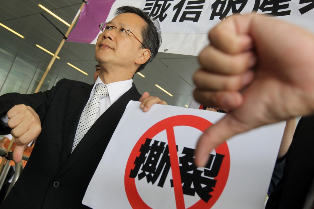 Lawmaker Kwok Ka-ki protests outside Legco. Photo: K.Y.Cheng