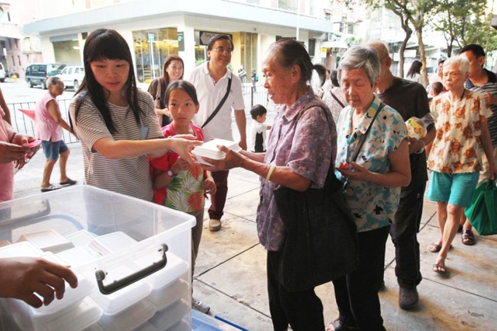 Every Sunday, Filipino helpers provide free meals. Photo: Dickson Lee