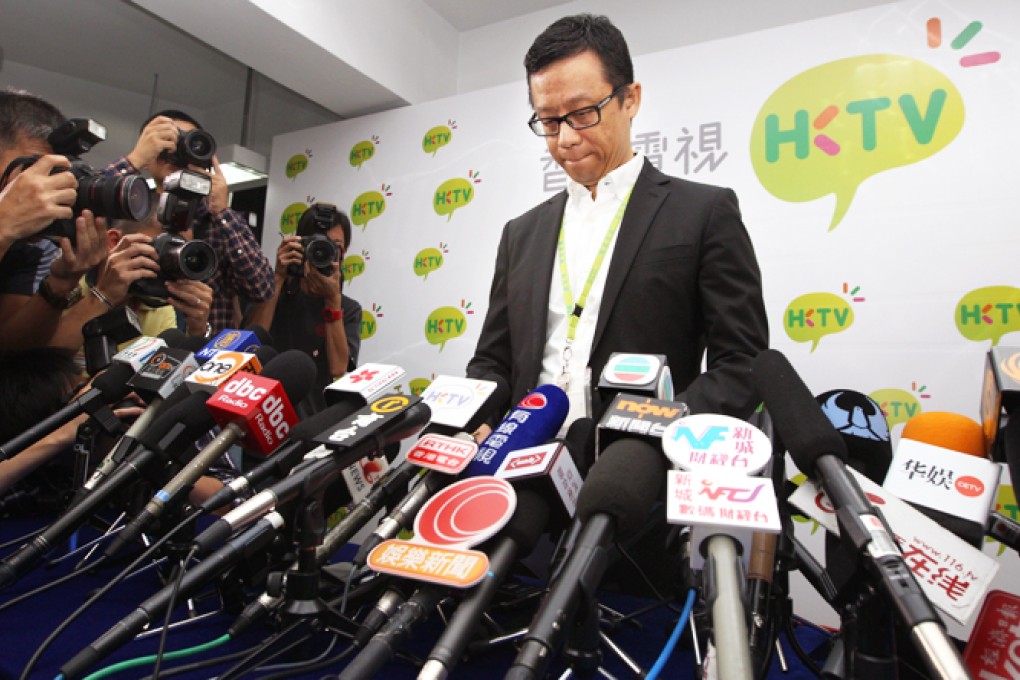 Ricky Wong with head bowed as he expresses his disappointment at the rejection of his application for a free-to-air licence. Photo: Felix Wong