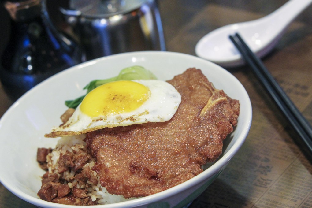 House-made pork chop rice with slow-cooked pork belly and egg. Photos: May Tse