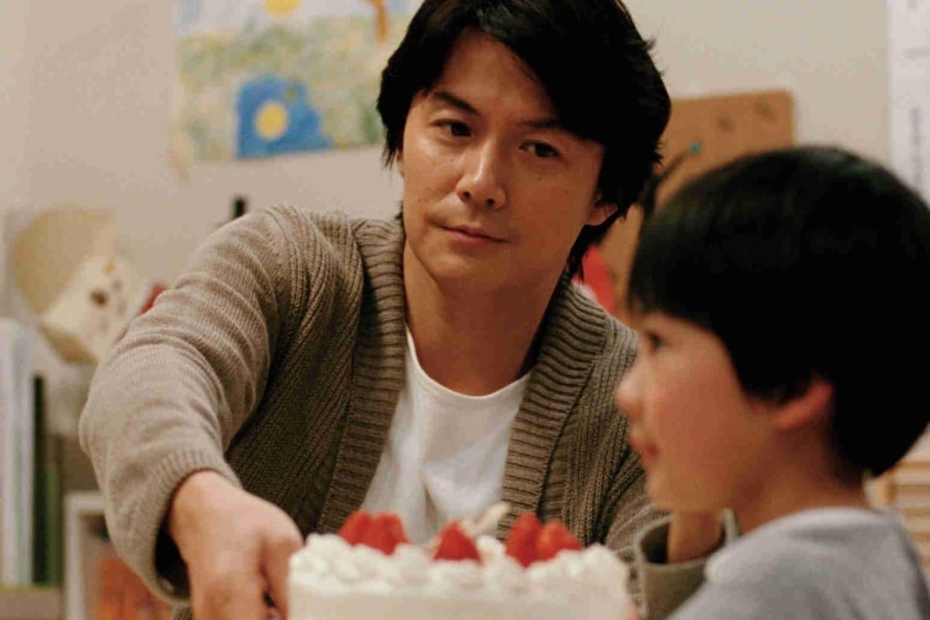 Scenes from the film Like Father, Like Son: Masaharu Fukuyama and Keita Ninomiya. Photos: AFP
