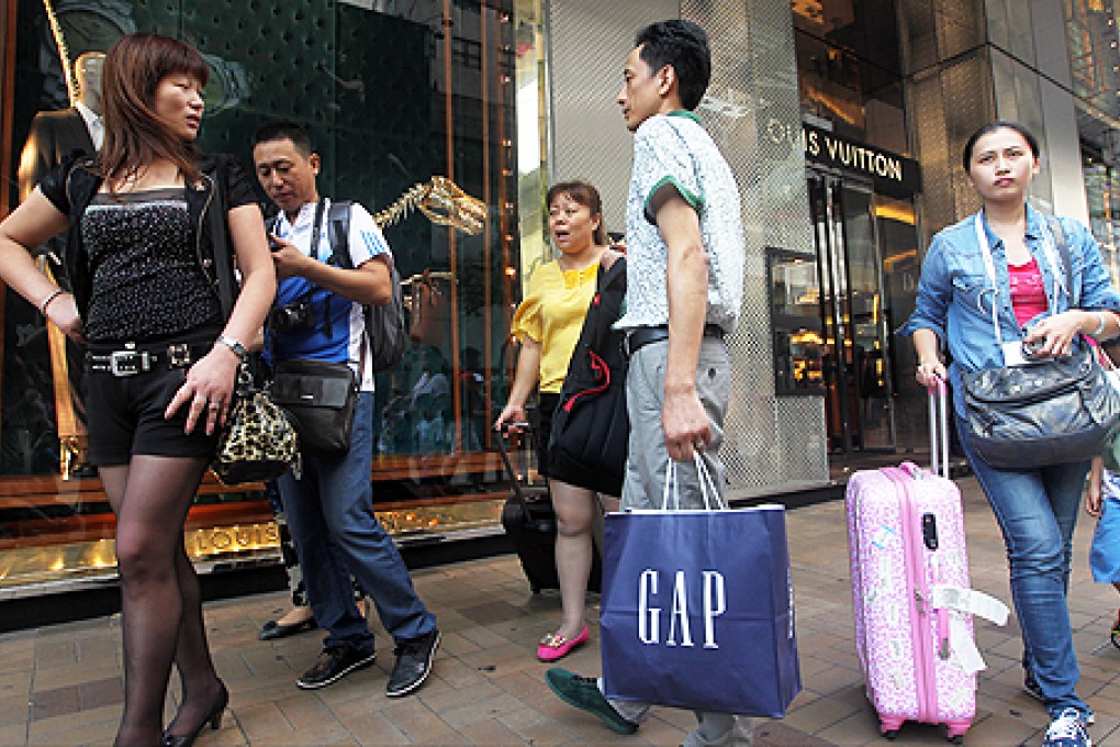 Mainland tourists on Canton Road in Tsim Sha Tsui. Photo: Sam Tsang
