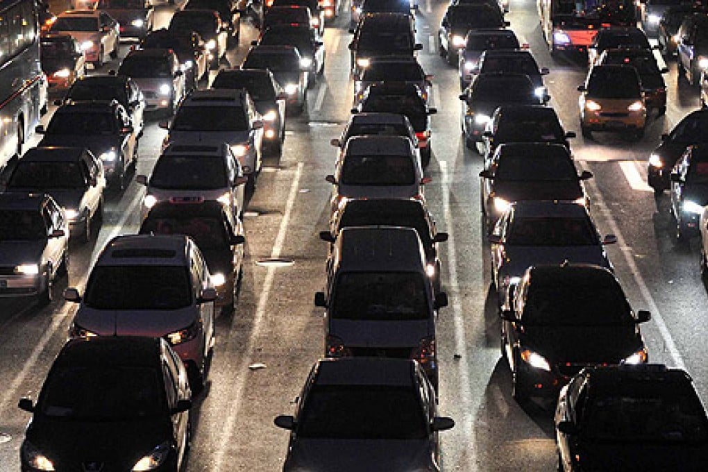 Beijing drivers will be restricted to using cars on odd or even days according to the number plate. Photo: Xinhua