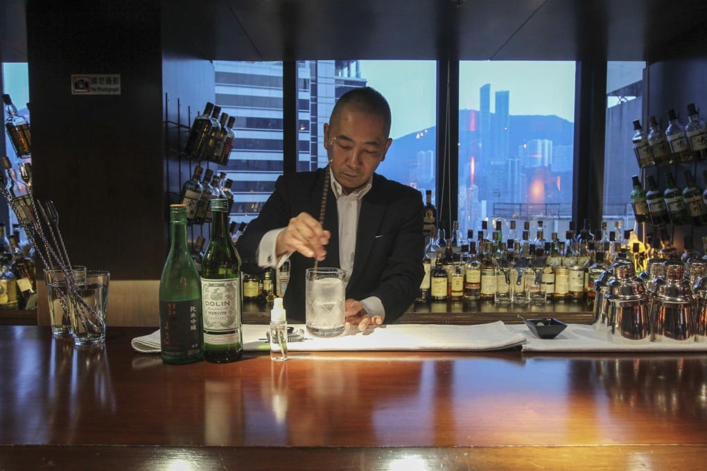 Barman Ichiro Hiidome mixes a Saketini (the final product is pictured below). Photos: Edward Wong
