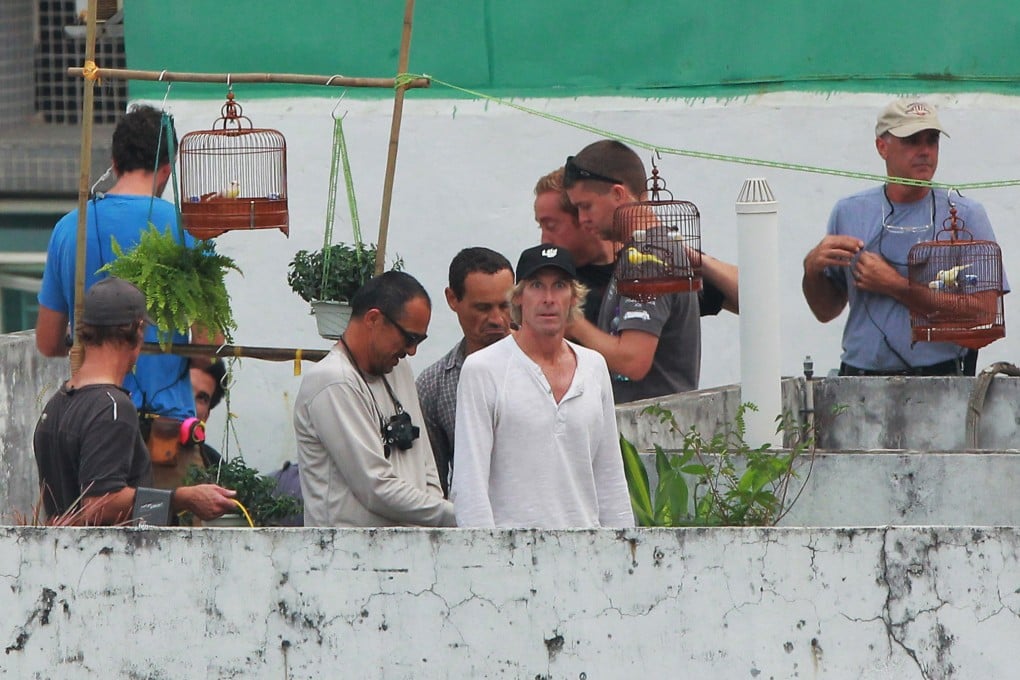 Michael Bay, centre, on set in Hong Kong on October 17. Photo: AP