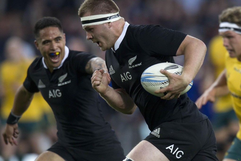 All Black Sam Cane surges his way to a try. Photo: AFP
