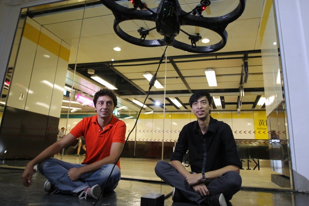 Artists Marco De Mutiis (left) and Kenny Wong Chi-chuen